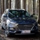 Blue Hyundai vehicle parked in the woods - Hyundai Performance Chips Increase Horsepower