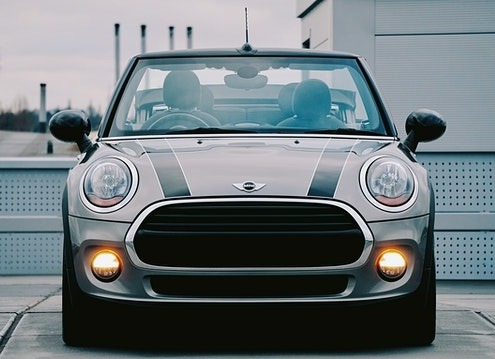 Gray Mini Cooper with lights on - Mini Performance Chips Improve Horsepower