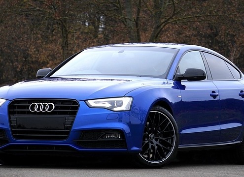 Blue Audi vehicle parked near trees - Chip Your Car Audi Performance Chips Improve Horsepower