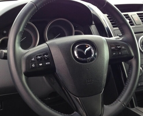 Front seat of Mazda vehicle - Mazda Performance Chips Improve Gas Mileage
